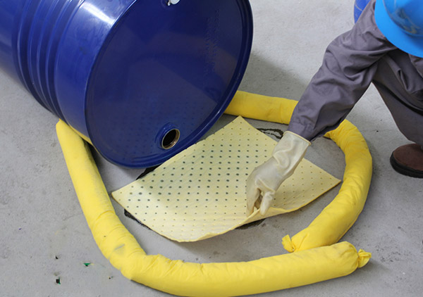 Oil absorbent cotton, absorbent cotton products
